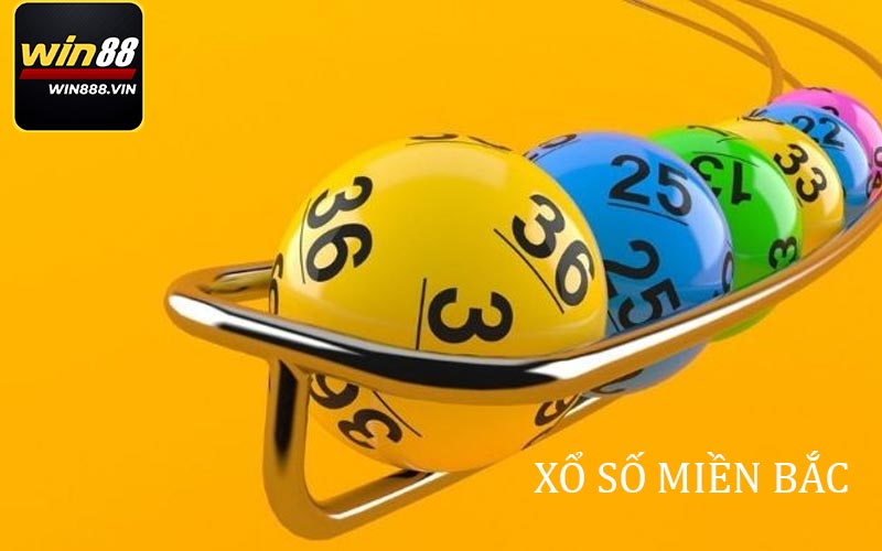 Colorful lottery balls on yellow background